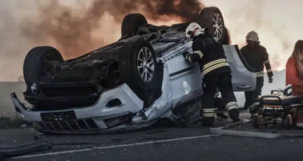 Major car accident showing a flipped car